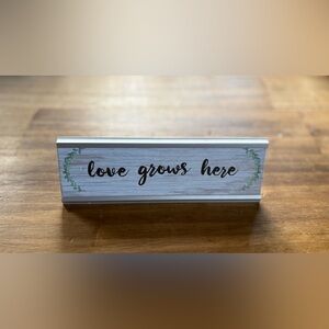 ‘Love Grows Here’ Sign